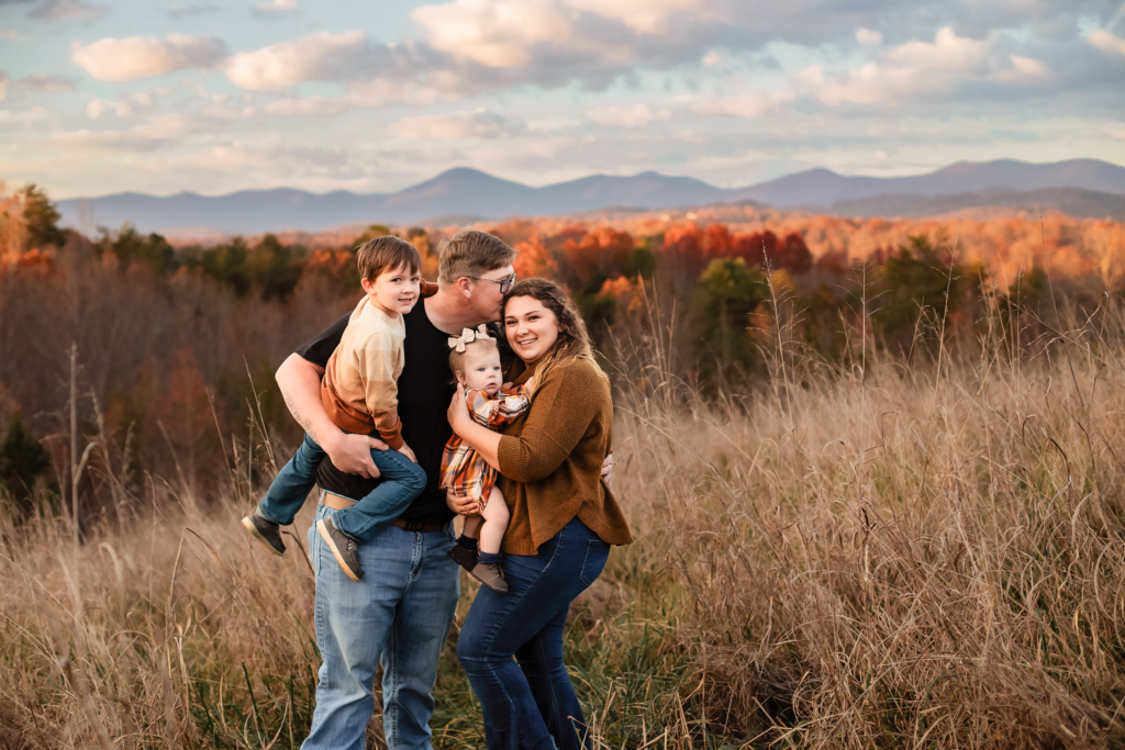 Family laughing together during a Gainesville family photographer session